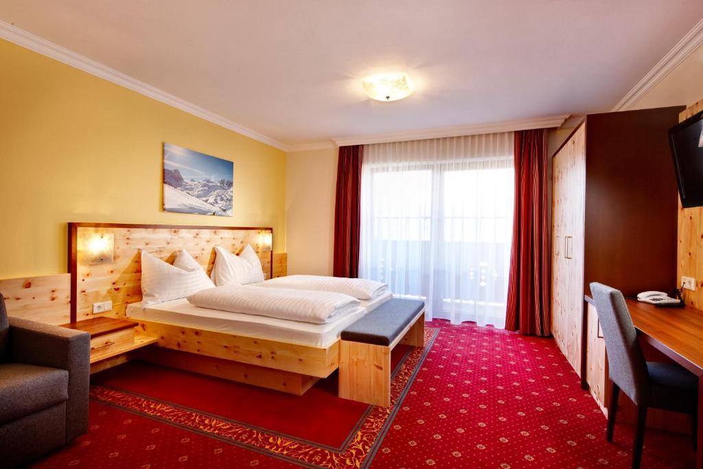 Hotel Erlebniswelt Stocker Шладминг Номер фото